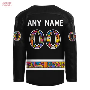 Close-up of the back of the LA Kings Salvadoran Heritage jersey, showing the colorful patterned numbers and customizable nameplate.