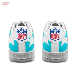 Heel view of the Bad Bunny Super Bowl custom Air Force 1s, displaying the custom 'Bad Bunny' shield logo on the heel tabs.