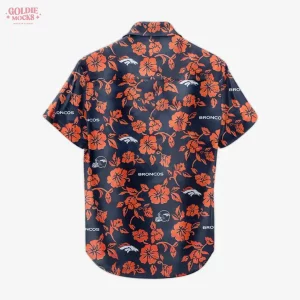 Back of the Denver Broncos Hawaiian shirt showing the all-over pattern of orange hibiscus flowers and team logos on a navy fabric.